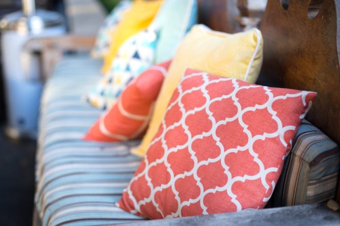 Bright throw cushions outdoors