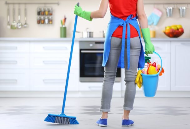 Woman with cleaning products ready for spring cleaning